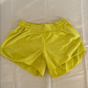 Hotty Hot Low rise 4 inch yellow shorts- Size 6